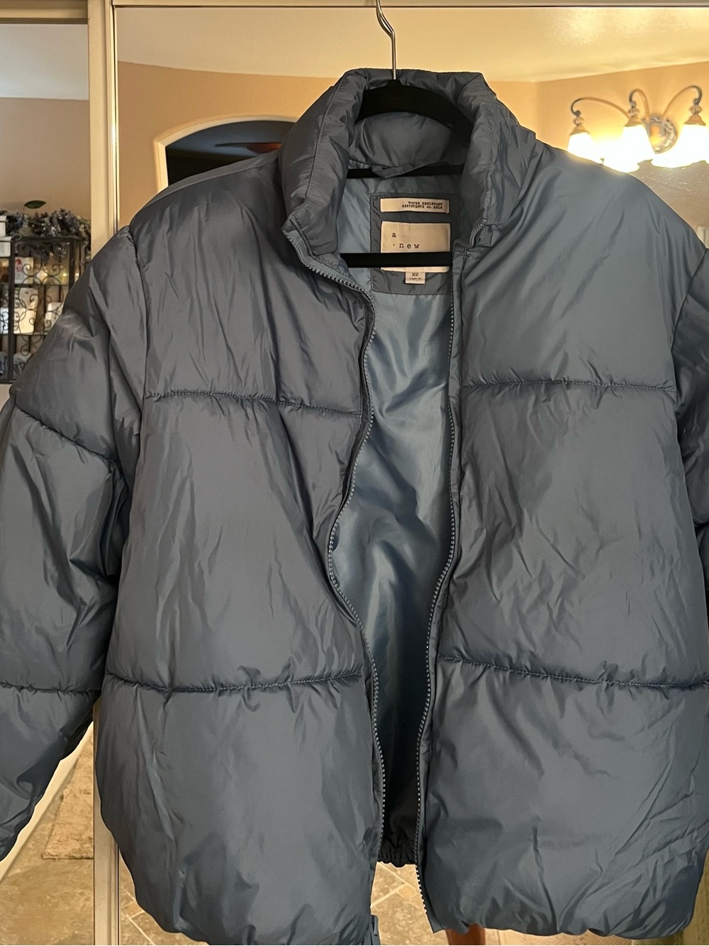 Woman's Blue Puffer Jacket -